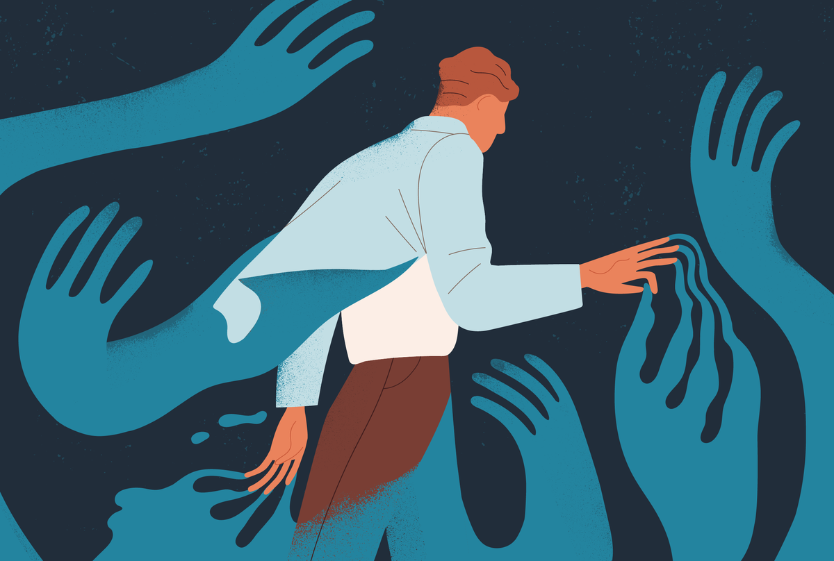 Na obrazku widać mężczyznę a wokół niego ręce próbujące go złapać.